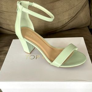 **Brand new** Mint colored strappy heel. Size 8